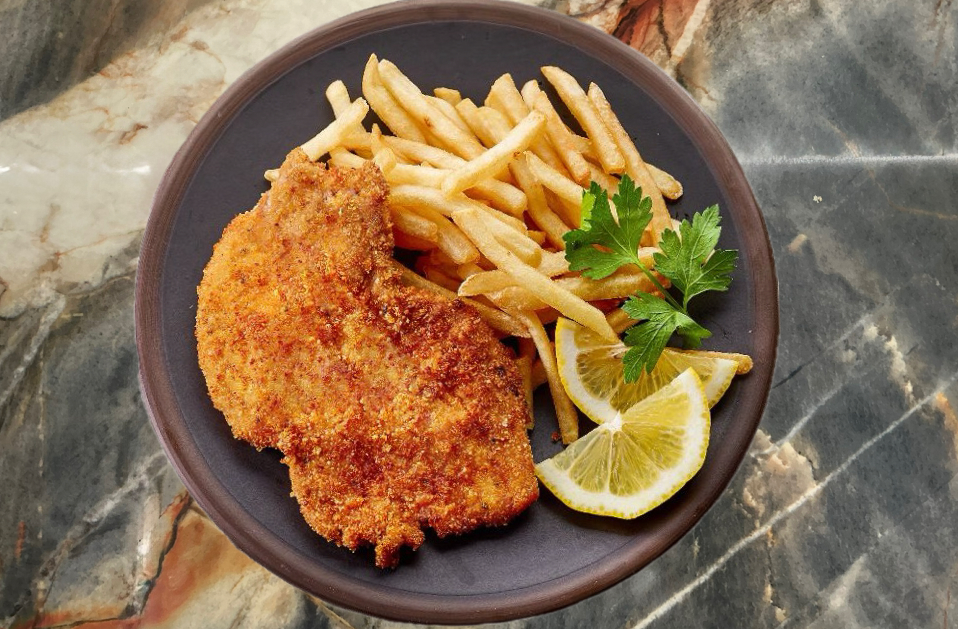 Cotoletta di pollo con patatine