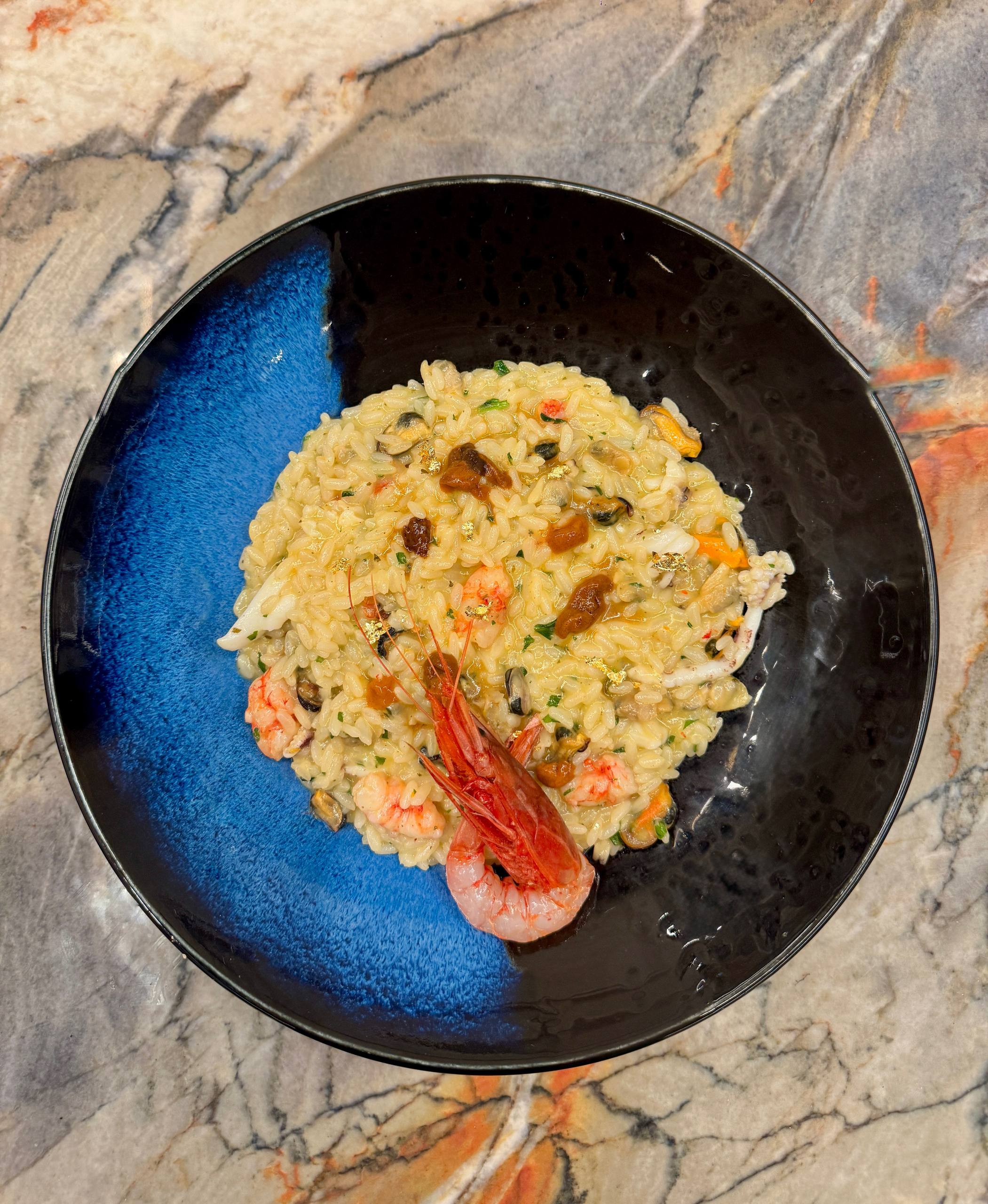 Risotto sussurri di mare con colatura di ricci
